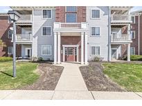 Welcoming building entrance with classic architectural details and a well-maintained walkway at 6231 Amber Creek Ln, Indianapolis, IN 46237