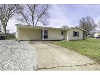 Charming single story home with a well maintained yard and ample parking space at 1839 Alton St, Beech Grove, IN 46107