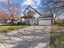 Charming two-story home features a spacious driveway and attached garage at 3521 Soaring Eagle Ct, Indianapolis, IN 46214