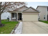 Charming single Gathering home with a well manicured lawn and a two car garage at 15524 Dusty Trl, Noblesville, IN 46060