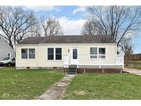 Charming single-story home with a quaint front porch and freshly cut lawn at 315 S Parkway Dr, Anderson, IN 46013