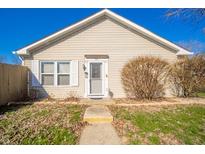 Charming single-story home featuring neutral siding, a well-kept lawn, and inviting front entrance at 142 Norbeck Ter, Indianapolis, IN 46217