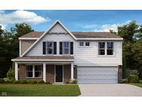Charming two-story home featuring brick accents, white shingles, black shutters and a two-car garage at 7098 Maidstone Cv, McCordsville, IN 46055