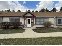 Charming single-story home with a covered entry and well-maintained landscaping at 1711 Lafayette Ave # 5, Lebanon, IN 46052