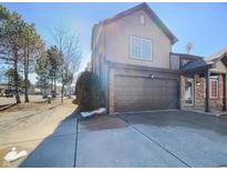 Inviting home with a two-car garage and appealing curb appeal and well maintained landscaping at 2632 Frasier Fir Dr, Greenwood, IN 46143