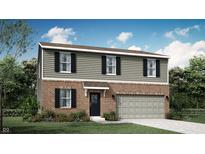 Two-story home with brick and siding, a gray garage door, and a well-maintained lawn at 11813 Vale St, Indianapolis, IN 46235