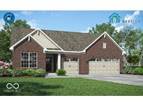 Charming brick home featuring a two-car garage and well-manicured lawn at 1255 Thornwood Dr, Greenwood, IN 46143