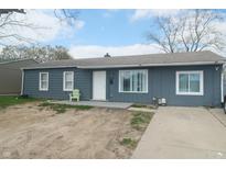 Charming single-story home with a simple yard and driveway at 5314 W 34Th St, Indianapolis, IN 46224