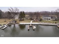 Expansive waterfront property with a private dock and access to a serene lake at 2005 Dakota Dr, Noblesville, IN 46062
