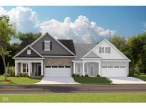 Charming two-story home with brick and siding, featuring a two-car garage and well-manicured lawn at 17220 Cole Evans Dr, Noblesville, IN 46060