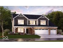 Charming two-story home features a brick facade, three-car garage, and manicured lawn at 540 Galveston Ln, Westfield, IN 46074