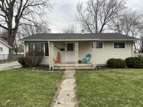 Charming single-story home featuring a cozy front porch, landscaped yard, and inviting entrance at 428 E Trevor St, Brownsburg, IN 46112
