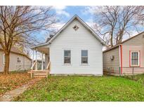 Charming single-Gathering home featuring a quaint front porch and well-maintained lawn at 1911 Wilcox St, Indianapolis, IN 46222