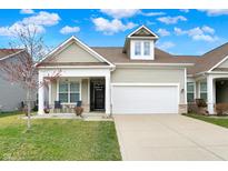 Charming single-Gathering home with a two-car garage, covered front porch and manicured lawn at 6288 Wonder Ln, Whitestown, IN 46075