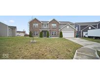 Two-story home featuring a well-maintained lawn and a two-car garage at 1436 Amberwoods Ct, Indianapolis, IN 46239