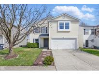 Charming two-story home with a well-manicured lawn and a welcoming front entrance at 2405 Providence Ct, Greenwood, IN 46143