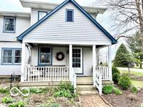 Charming home featuring a quaint front porch, perfect for relaxing and enjoying the outdoors at 3030 N 600 E, Lebanon, IN 46052