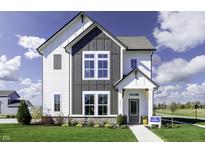 Charming two-story home with a modern farmhouse design and well-manicured lawn at 781 Rose Garden Way, Westfield, IN 46074