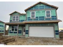Two-story home under construction, featuring a two-car garage and a covered porch at 221 Ames Dr, Whiteland, IN 46184