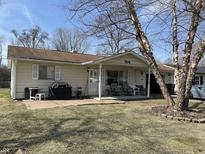 Charming single-story home with a cozy front porch and well-maintained lawn at 3114 Danbury Rd, Indianapolis, IN 46222