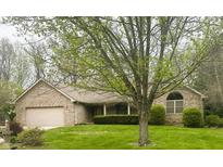 Charming brick home featuring an attached garage and a well-maintained front lawn, perfect for suburban living at 2690 Trailridge Ct, Martinsville, IN 46151