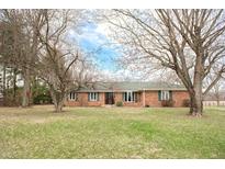 Charming brick ranch home featuring green shutters and a well-maintained front lawn at 3110 S County Road 225 East, Danville, IN 46122