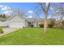 Charming single-story home with a well-manicured front yard and attached two-car garage at 3724 W 42Nd Ter, Indianapolis, IN 46228