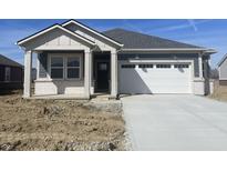 Charming single-story home featuring blue siding, white trim, and a spacious two-car garage at 5380 W Glenview Dr, McCordsville, IN 46055