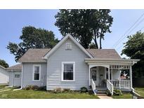 Charming single-story home featuring a well-maintained lawn, neutral siding, and a welcoming front porch area at 159 N Lincoln St, Martinsville, IN 46151