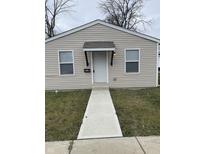 Charming single story home with neutral siding, inviting front door, and walkway at 2968 N Gale St, Indianapolis, IN 46218