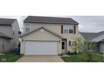 Charming two-story home with a two car garage and neatly maintained landscaping at 4063 Orchard Valley Blvd, Indianapolis, IN 46235