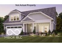 Charming home featuring a two-car garage, manicured lawn and craftsman-style architectural details at 9150 Bryce Cir, Zionsville, IN 46077