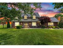 Charming two-story home with brick accents, lush lawn, and beautiful landscaping at 4545 W 200 S, Lebanon, IN 46052