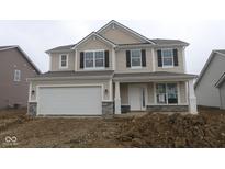 Inviting two-story home with neutral siding, a two-car garage, and classic black shutters at 10027 Redwood Peak Ln, Indianapolis, IN 46259
