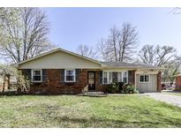 Charming single-story brick home with a well-maintained lawn and inviting curb appeal at 4433 Windsor Rd, Brownsburg, IN 46112