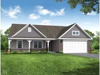Charming single-story home featuring a well-manicured lawn, brick accents, and an attached two-car garage at 19245 Red Willow Ln, Noblesville, IN 46062