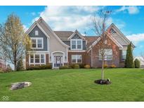 Beautiful two-story home with brick and siding exterior and well-manicured lawn at 3728 Dunellen Cir, Carmel, IN 46074