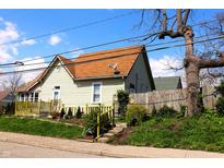 Charming home featuring updated roof, siding, and landscaping at 2025 Barth Ave, Indianapolis, IN 46203