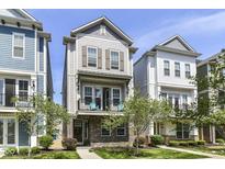 Attractive two-story home boasting a charming balcony and brick facade at 13316 E Lieder Way, Fishers, IN 46037