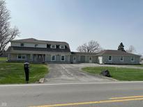 Spacious home with stone exterior, large front yard and driveway, perfect for a Gathering at 4902 N 700 W, McCordsville, IN 46055