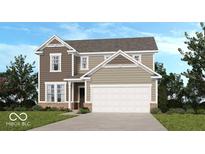Charming two-story home with attached two-car garage, neat lawn, and traditional architectural details at 1117 Stubble Run, Danville, IN 46122
