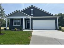 Charming home featuring blue siding, white trim, a spacious driveway, and a two-car garage at 3933 Donaldson Creek Ct, Clayton, IN 46118