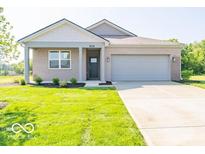 Charming single-story home with a well-maintained lawn and neutral-colored exterior at 3949 Donaldson Creek Ct, Clayton, IN 46118