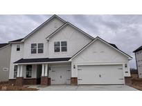 New construction two-story home with a white facade, a two-car garage, and a welcoming front porch at 18944 Seaforth Way, Westfield, IN 46074