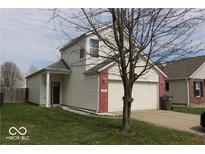 Charming two-story home with vinyl siding, brick accents, and an attached two-car garage at 42 White Lick Dr, Indianapolis, IN 46227