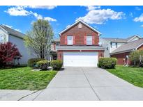 Charming brick two-story home with a well-maintained lawn and inviting curb appeal with red shutters at 8116 Barksdale Way, Indianapolis, IN 46216