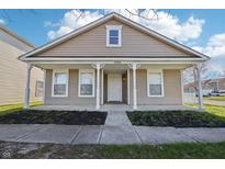 Charming single-story home featuring a cozy front porch with decorative columns and a well-maintained lawn at 14226 Marilyn Rd, Noblesville, IN 46060