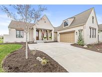 Charming single-Gathering home boasts a brick exterior, manicured lawn, and an attached garage at 1501 Chanson Ln, Westfield, IN 46074