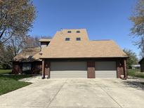 Inviting home with a large attached garage and driveway at 5298 Royal Troon Way, Avon, IN 46123