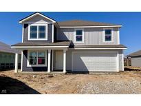 New two-story home with a two-car garage and a combination of gray siding and dark blue siding accents at 1268 Fleming Dr, Greenfield, IN 46140